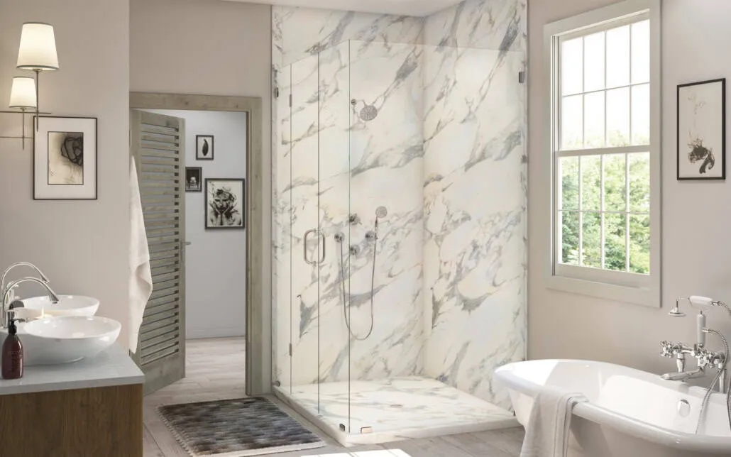 Marble-look glass-enclosed shower beside a clawfoot tub